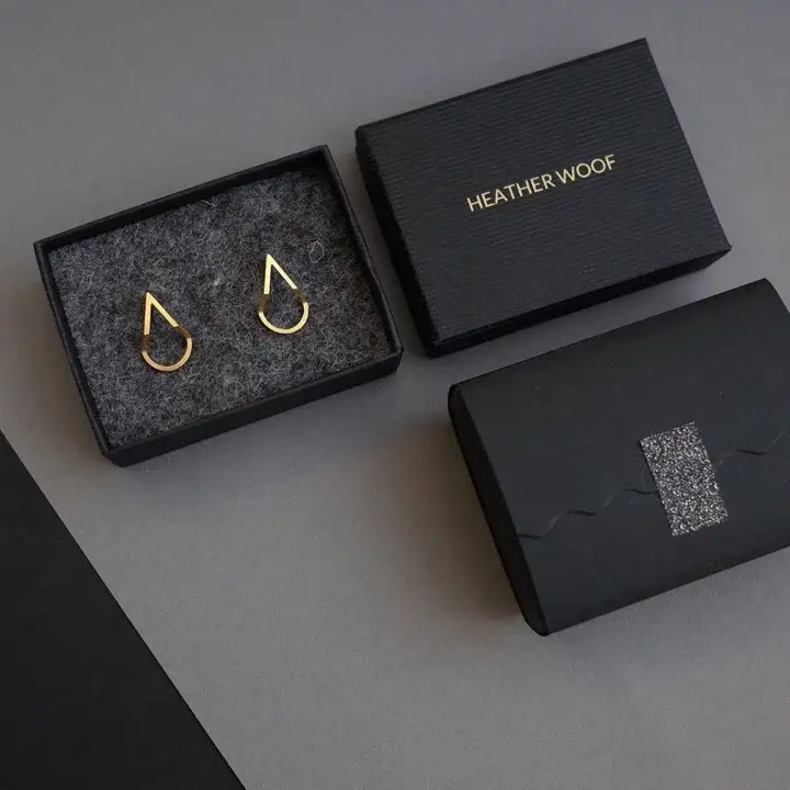 Small luxury earring boxes with soft foam inserts and custom logo foil stamping