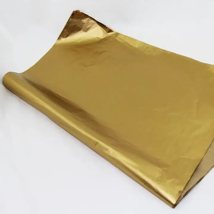 Luxury tissue paper with shiny metallic gold foil for high-end product unboxing