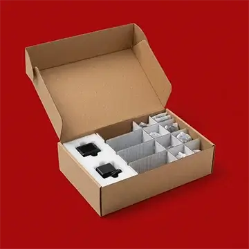 Custom cardboard box with protective foam inserts and corrugated dividers for organized packaging.