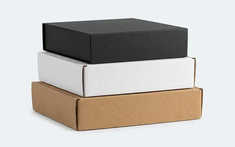 Custom boxes displayed in various materials like eco-friendly Kraft, corrugated, and rigid board
