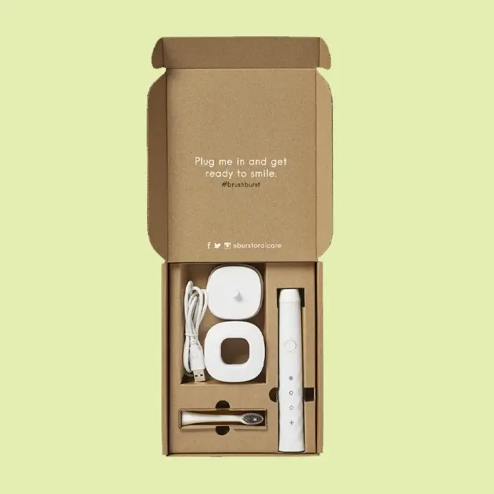 Premium electric toothbrush boxes with product separators and kraft stock