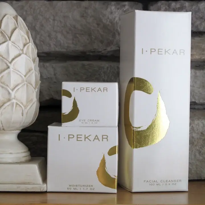 Skincare cream boxes with gold foiling and soft-touch lamination