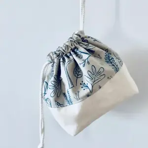 Personalized fabric drawstring pouches for jewelry and small gifts