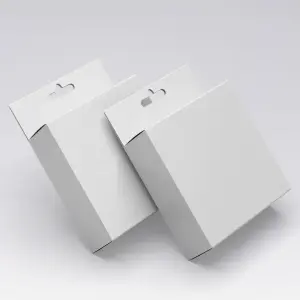 Retail hang tab packaging box for pegboard displays
